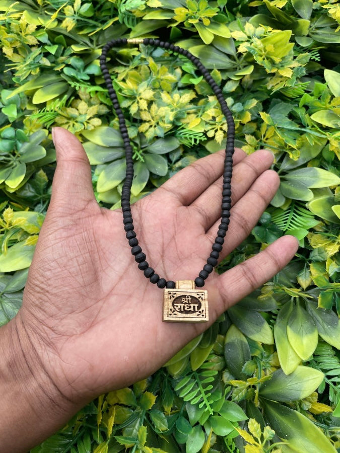 Shri Radha Locket Filled With Braj Raj, Black Origjnal Tulsi Mala The Vrinda Store - Original Tulsi Kanthi Mala Shop In Vrindavan