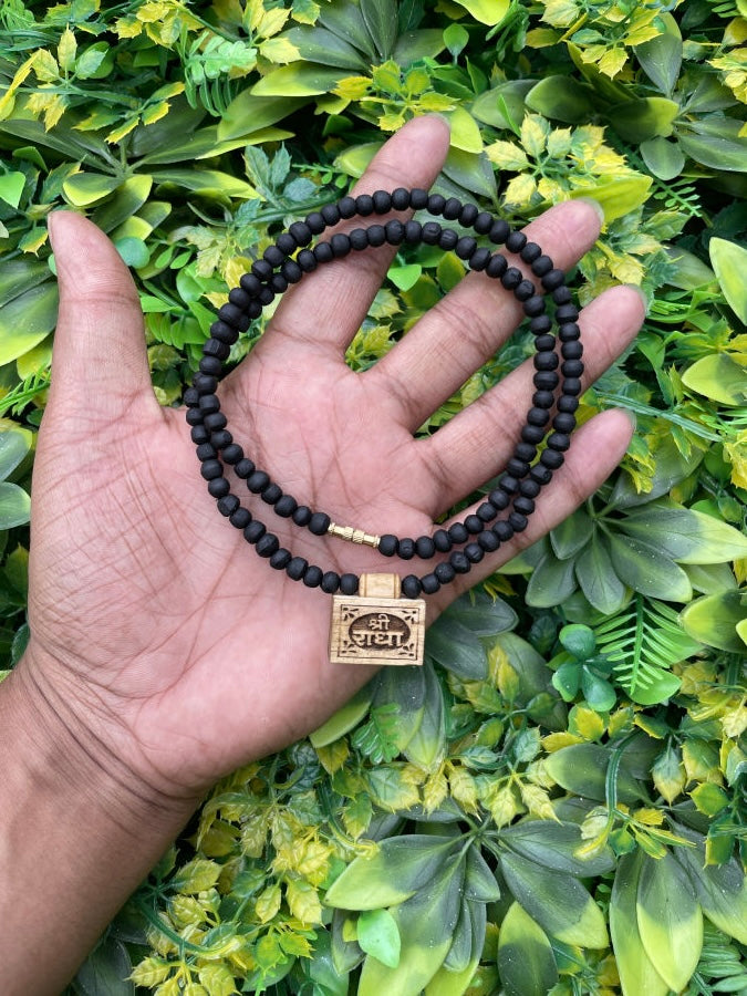 Shri Radha Locket Filled With Braj Raj, Black Origjnal Tulsi Mala The Vrinda Store - Original Tulsi Kanthi Mala Shop In Vrindavan