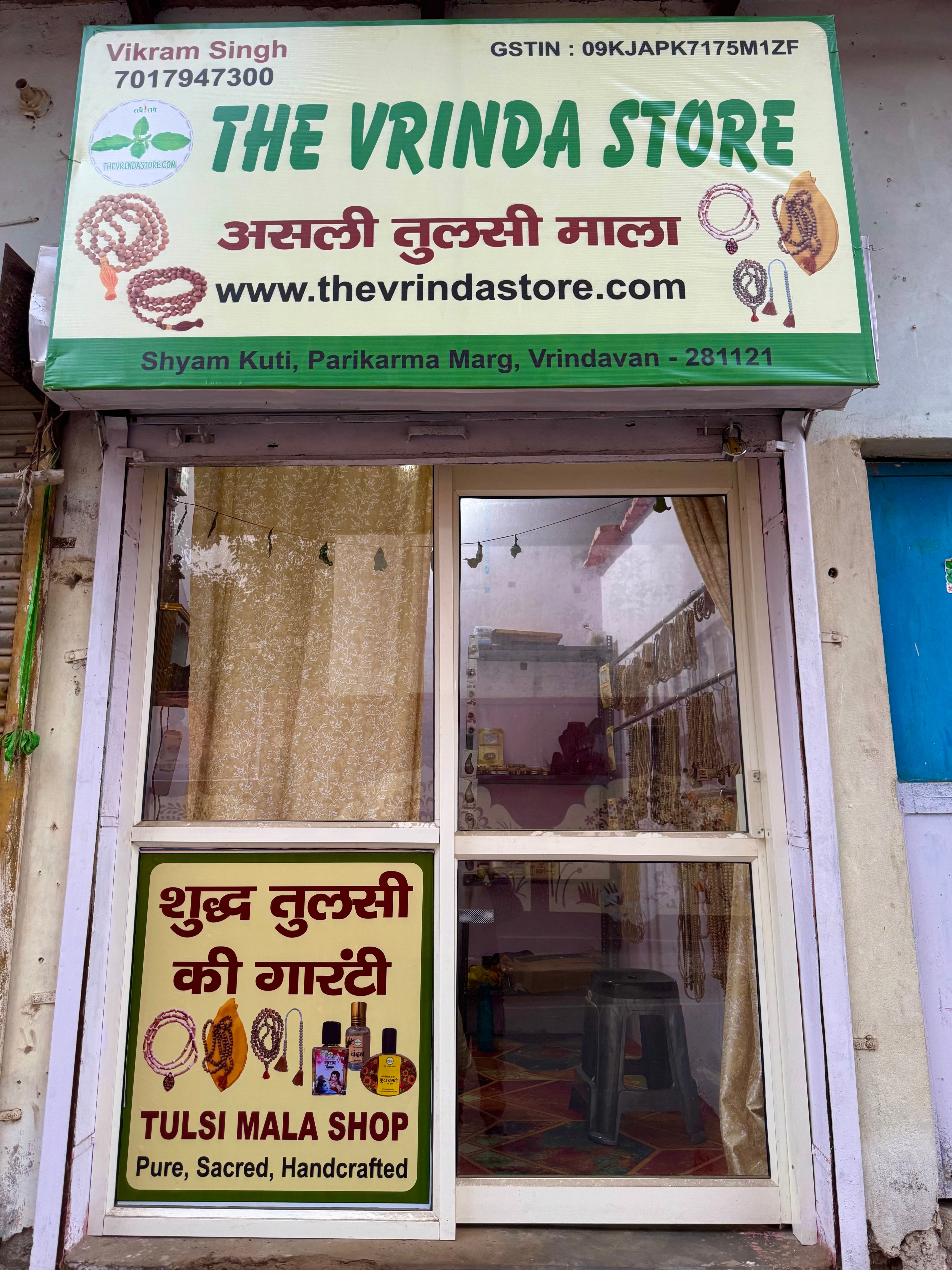 Storefront of The Vrinda Store with signage and window display.